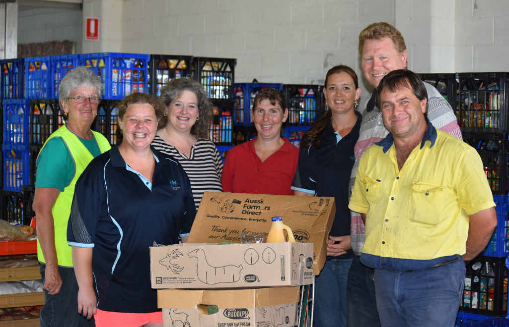 FESTIVE SPIRIT: (From left) Marlene Beattie and Jenny Creed from Food Assist with Sarah Myer, Mandy Gilmore, Food Assist’s Esther Spicer, Brian Nothdurft and Noel Grosskopf with the Christmas hampers. FESTIVE SPIRIT: (From left) Marlene Beattie and Jenny Creed from Food Assist with Sarah Myer, Mandy Gilmore, Food Assist’s Esther Spicer, Brian Nothdurft and Noel Grosskopf with the Christmas hampers.